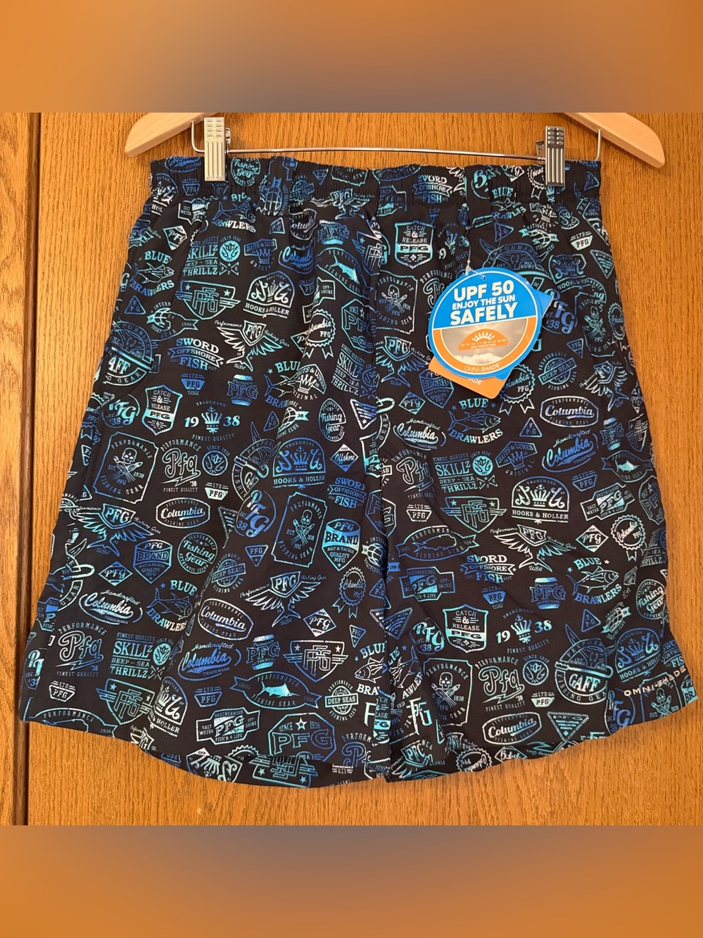 Columbia Black Swim Shorts with Blue & Teal Badge Print 8” Size Small